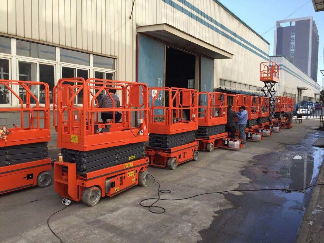 Safety Load 320KG Hydraulic Scissor Lift With Working Height 13.8m Orange Color